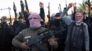 Masked Sunni gunmen chant slogans against the Iraqi Shiite-led government during a protest in Fallujah city, western Iraq, 07 January 2014. Fresh clashes erupted on 07 January in restive western Iraq between tribesmen and al-Qaeda militants trying to enter the city of Ramadi. The fighting was underway in Ramadi, the capital of Anbar province, as militants of the Islamic State in Iraq and the Levant (ISIL) were trying to enter the city.